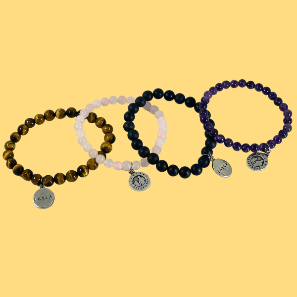  all four bracelet options together. Amethyst, black agate, rose quartz and tiger's eye